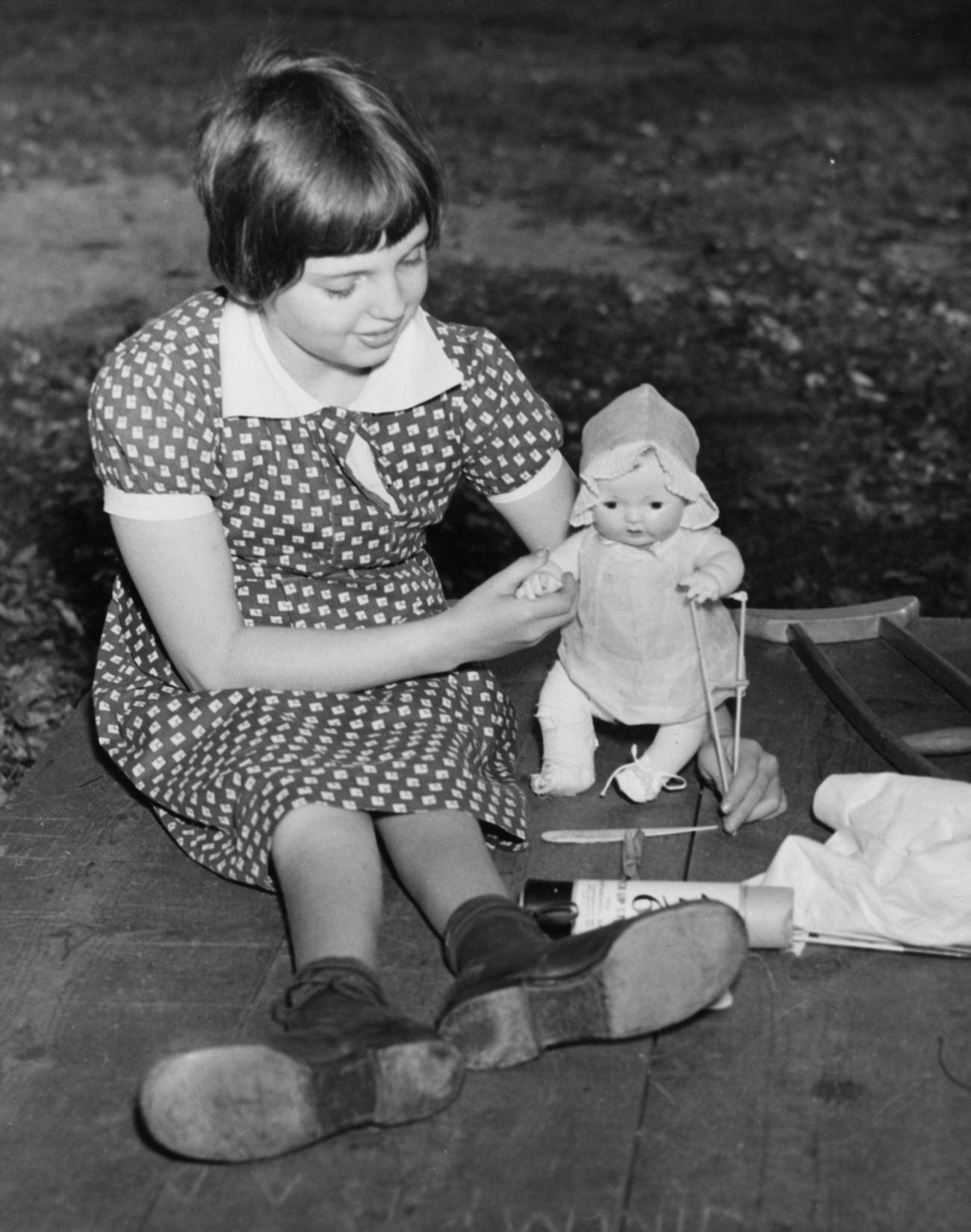 Young Girl With Crutch And Doll At St. Giles Hospital, 1945