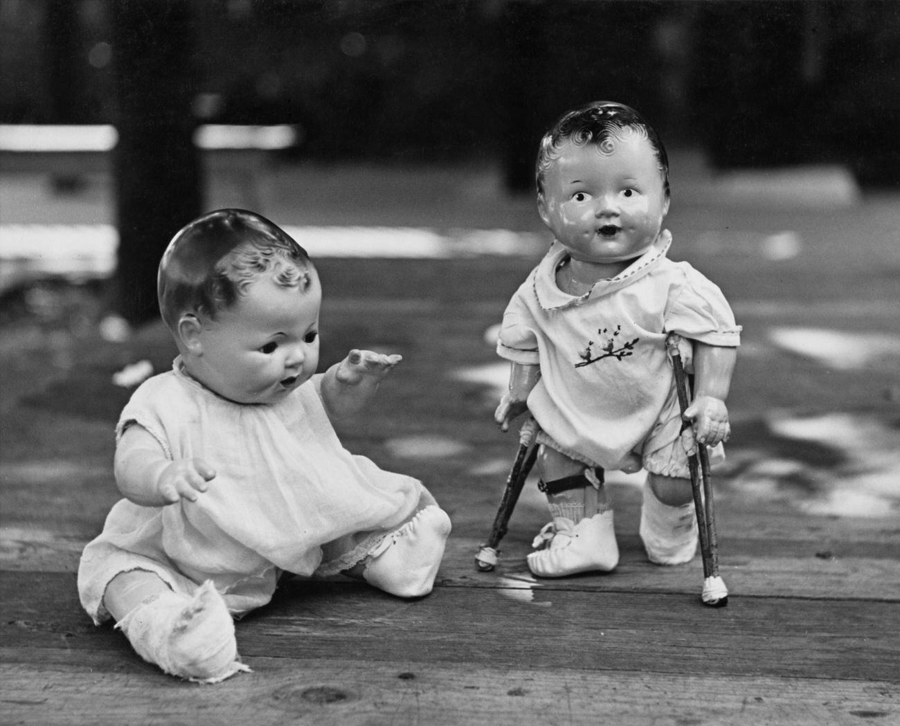 Two Dolls With Casts On Legs At St. Giles Hospital, 1945