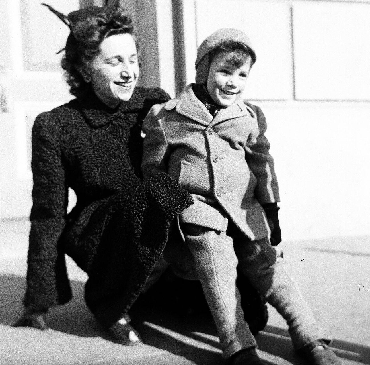 Woman And Boy In Winter Clothing Posing Outdoors, 1944