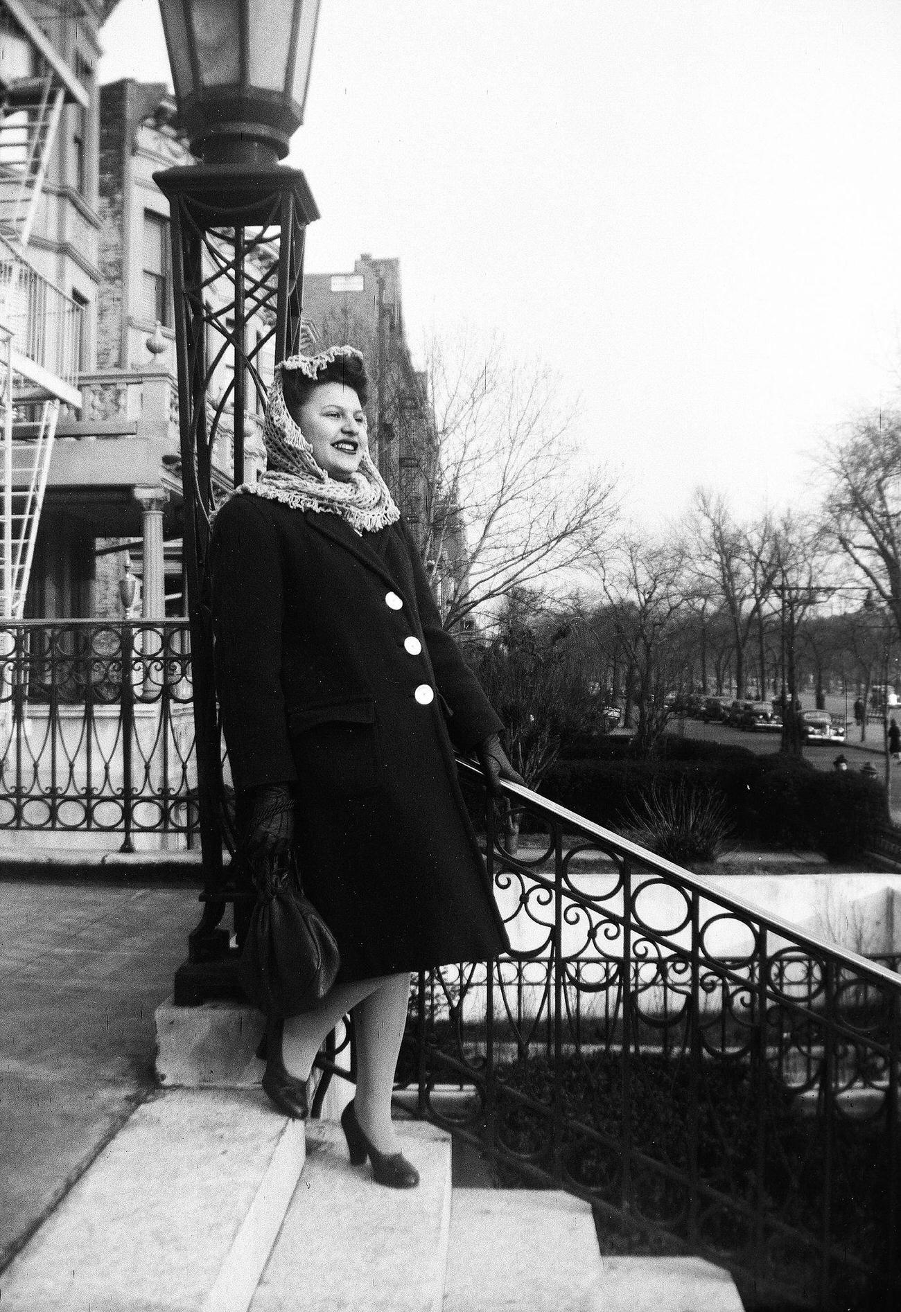 Woman Standing On A Building Stoop, 1944