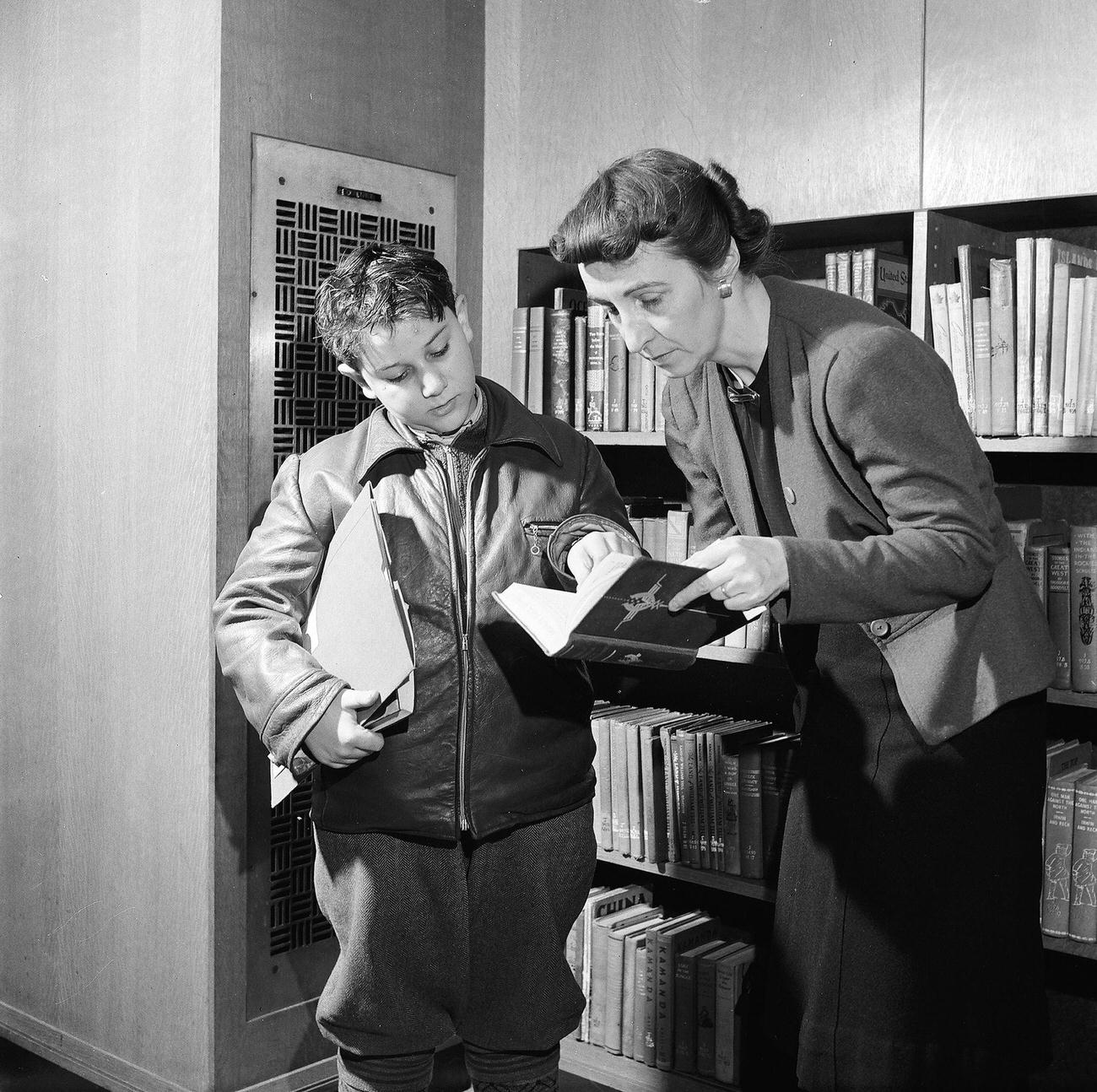 Librarian Helps Kids Choose Books, 1947