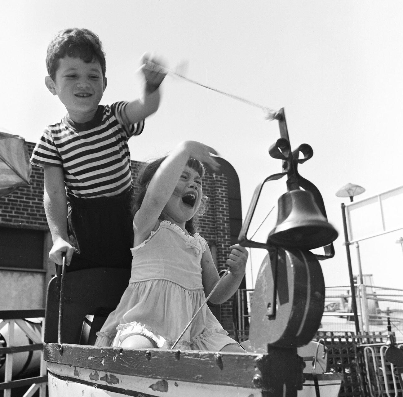 Siblings In Uss Ohio Ride At Amusement Park, 1948