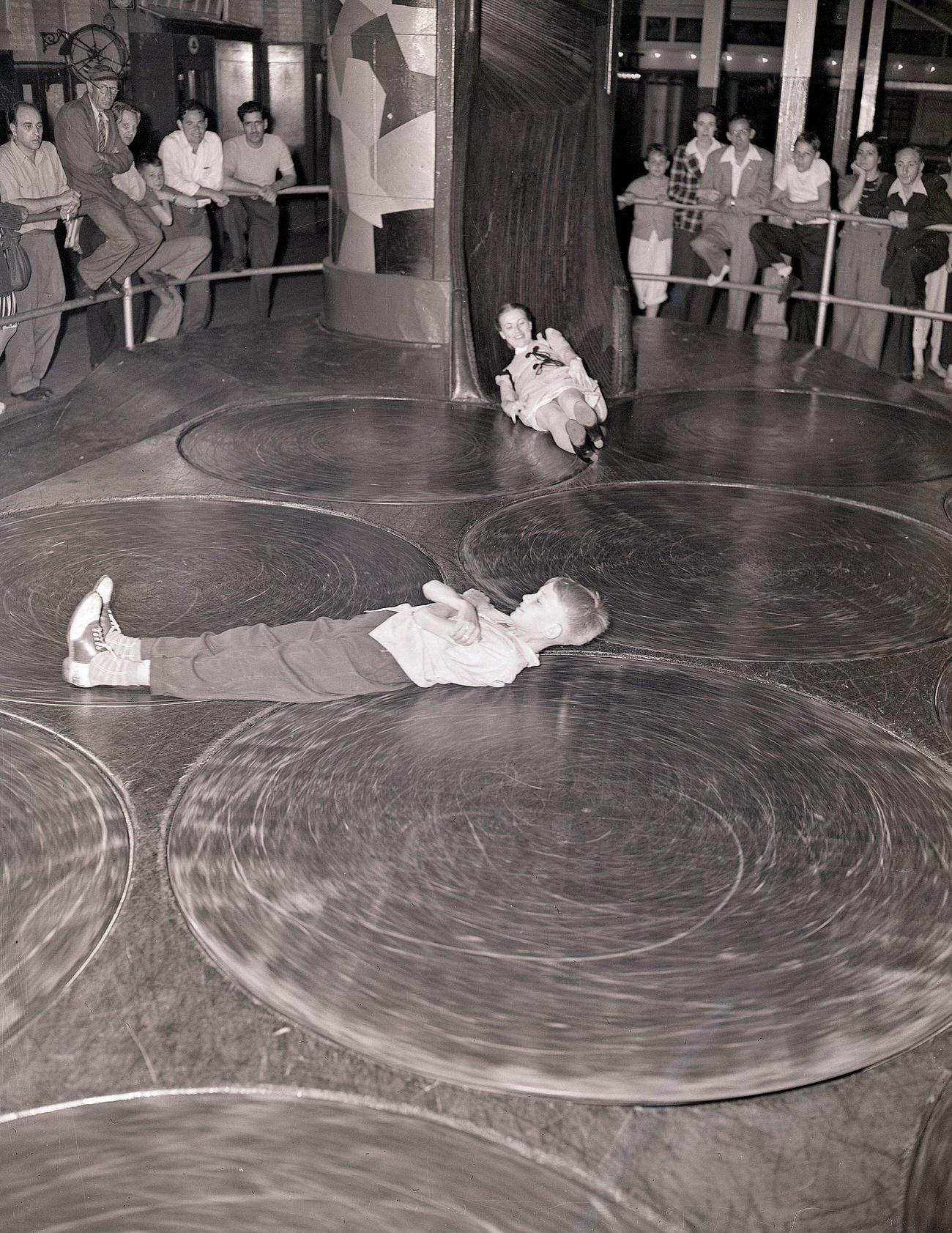 Children On Whirling Discs At Coney Island, 1946