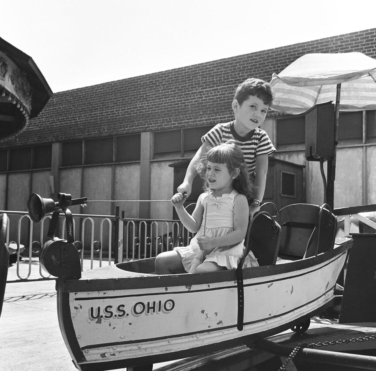 Siblings Enjoying A Wooden Uss Ohio Ride At Coney Island, 1948