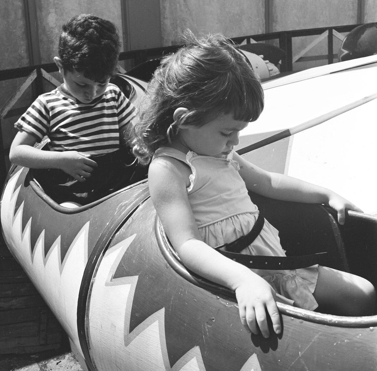 Siblings Sit In An Amusement Park Ride At Coney Island, 1948