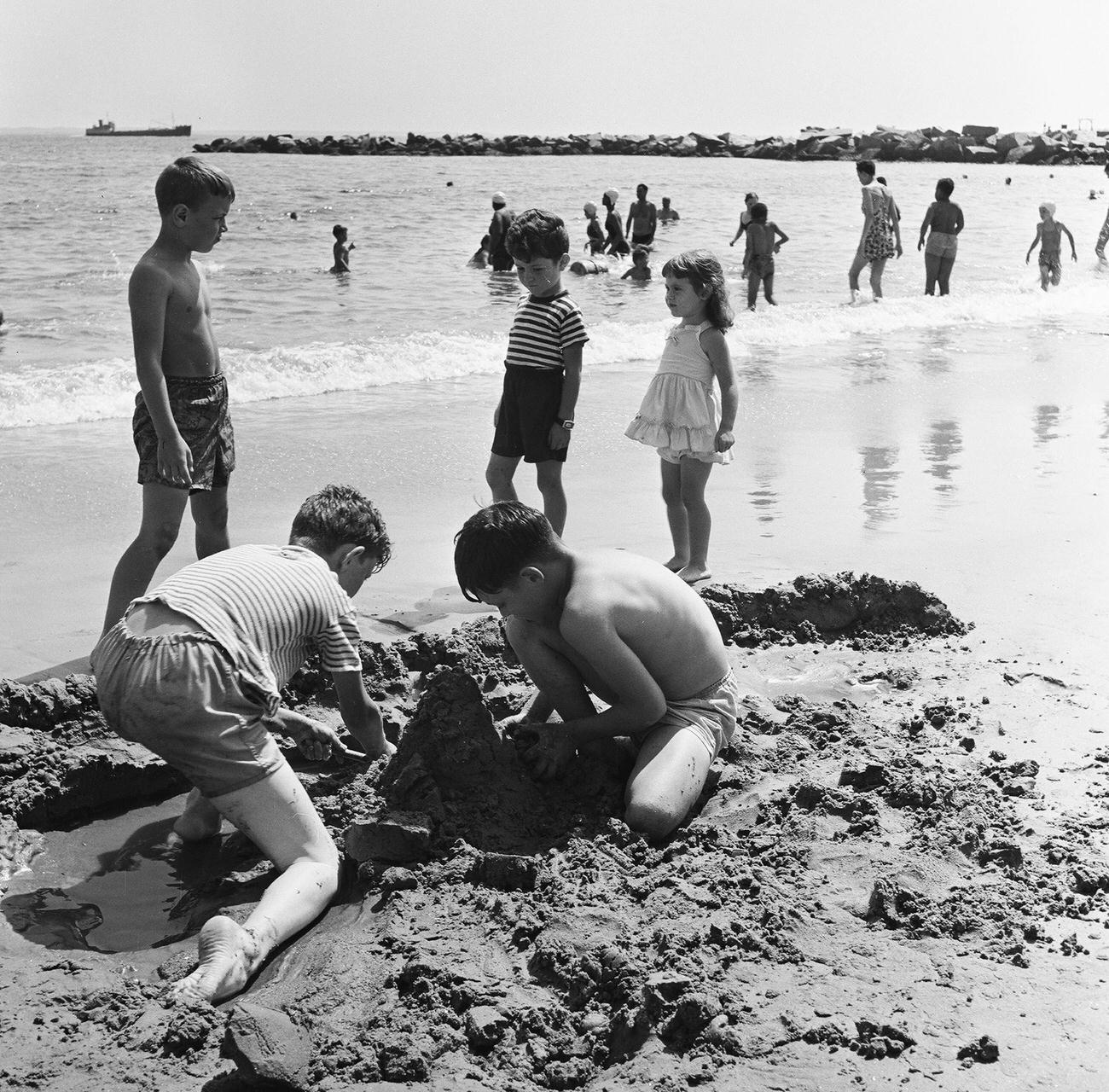 Children Build Sand Castles And Play On Coney Island Beach, 1948