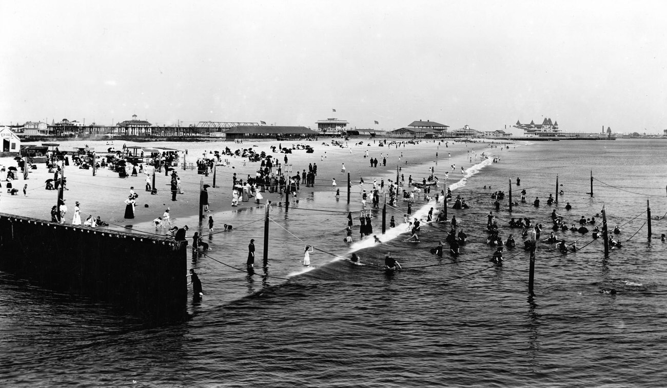 Beachgoers At Coney Island Beach With Manhattan Hotel In Distance, Early 1910S