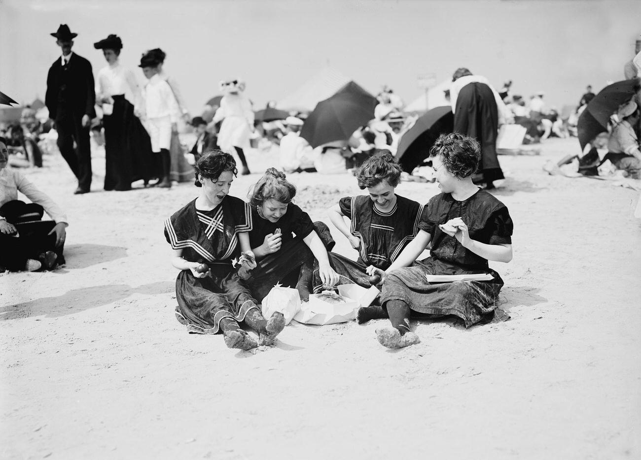 Young Women Eating Lunch On Coney Island Beach, Circa 1900
