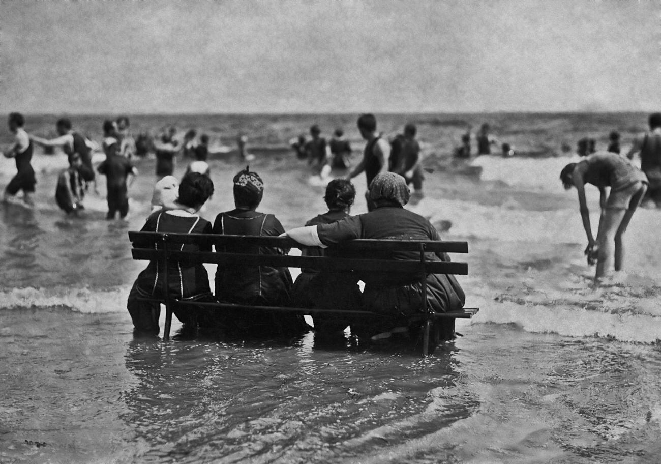 Women Sharing A Bench In Surf At Coney Island, 1904