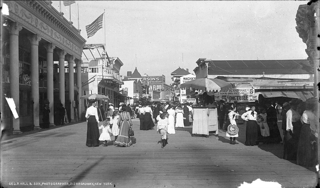 Pedestrians And Funhouses Along The Bowery, Mid-1900S