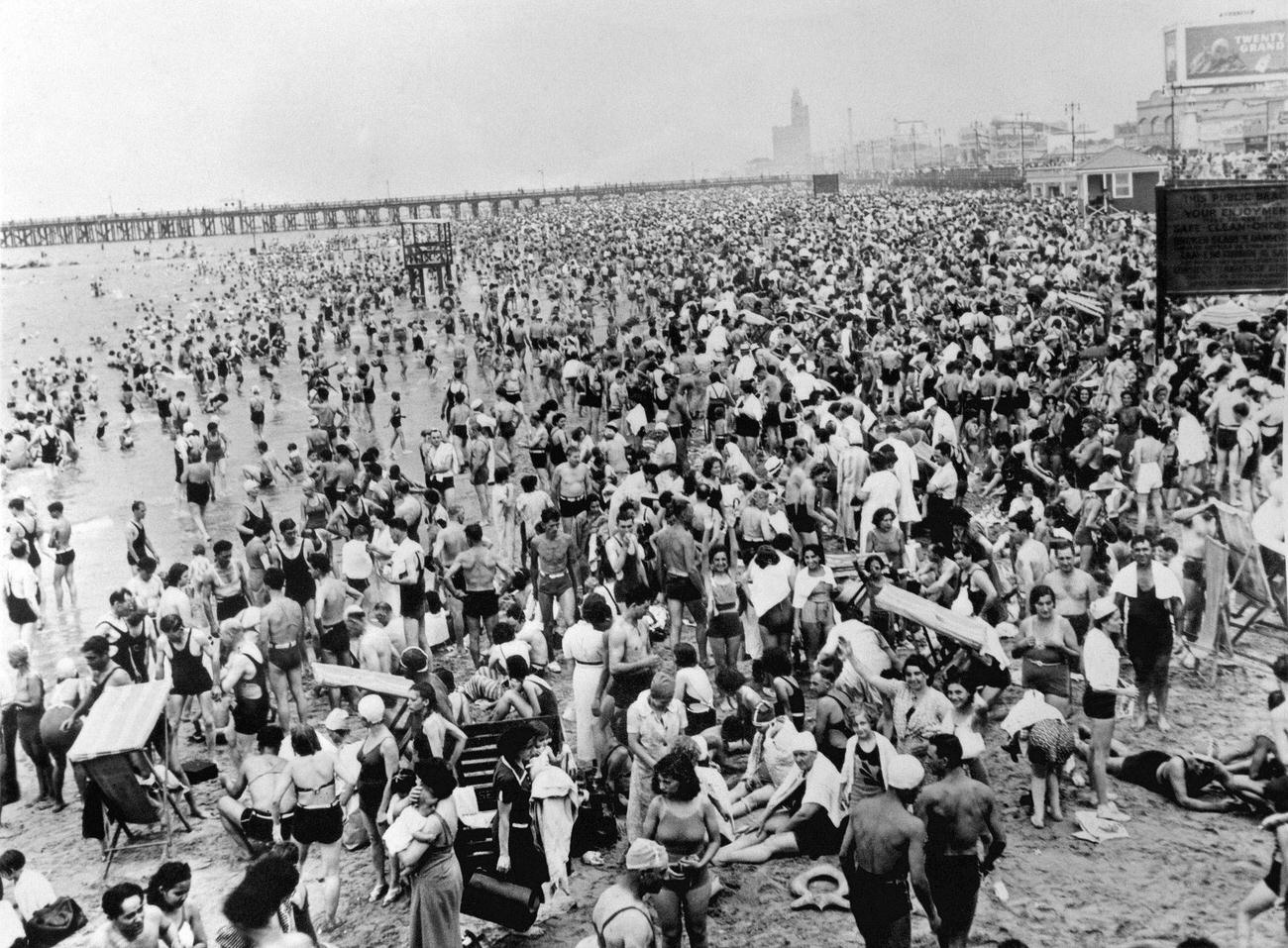 Crowded Coney Island Beach Refreshes Boaters, April 8, 1939
