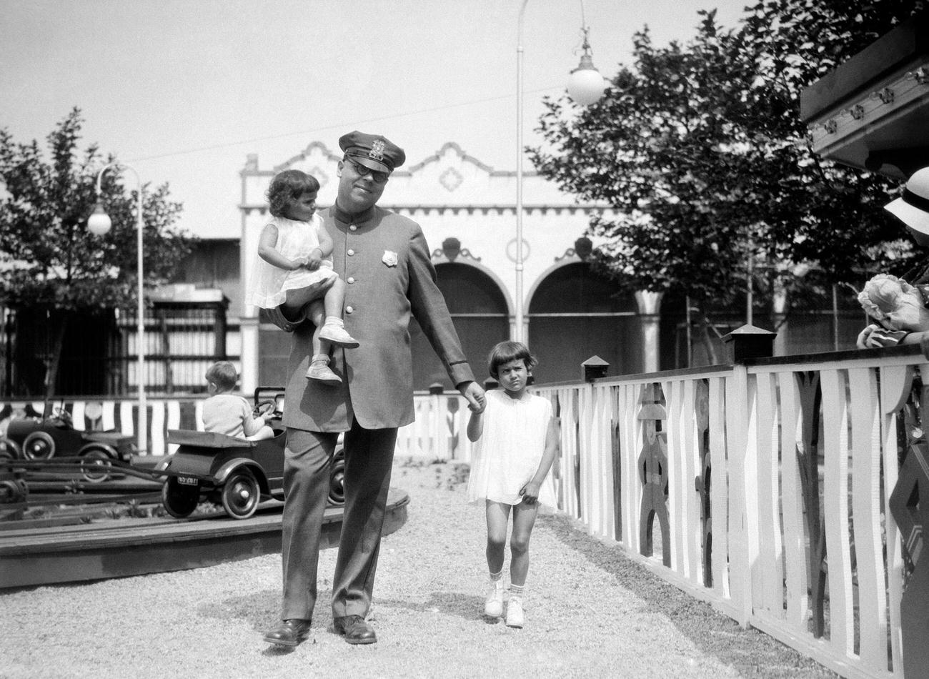 Police Entertaining Lost Children At Coney Island, 1931