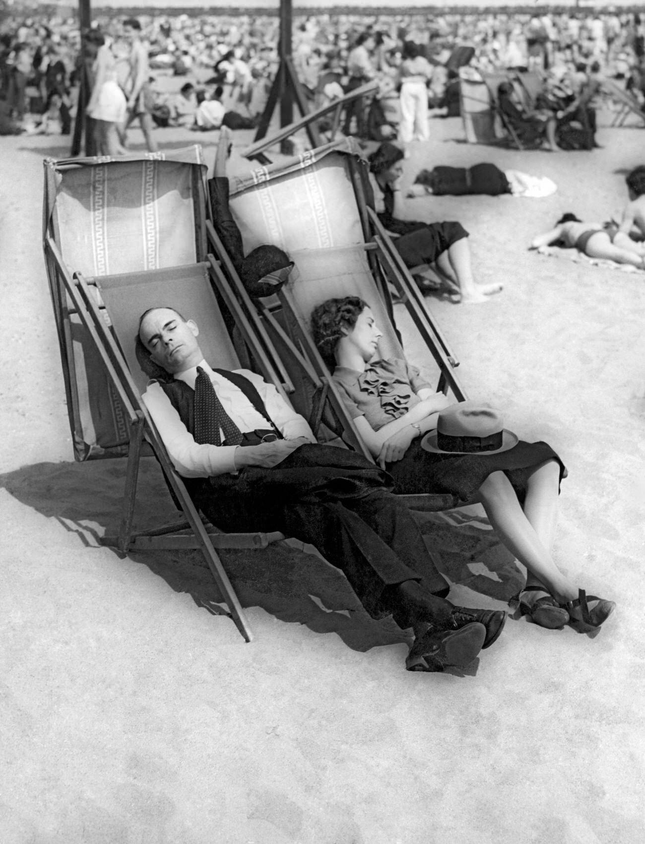 Couple Takes A Nap On Coney Island Beach, Circa 1935