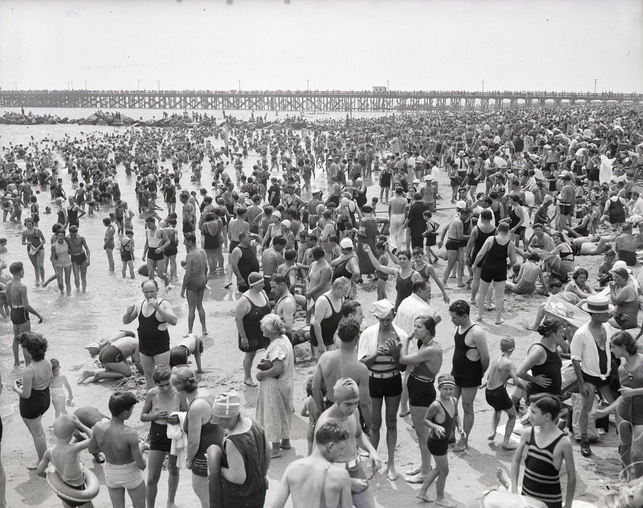 Coney Island Beach Crowd With Boardwalk In Background, August 5, 1935