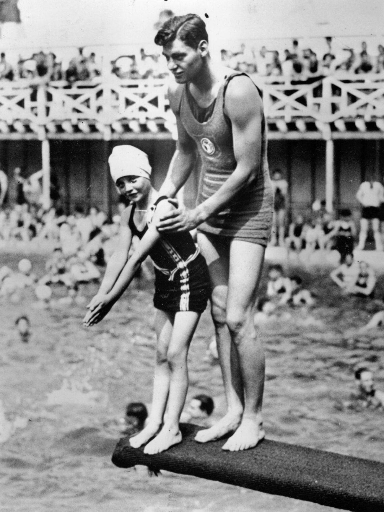 Johnny Weissmuller Teaches Diving At Coney Island Pool, Circa 1936