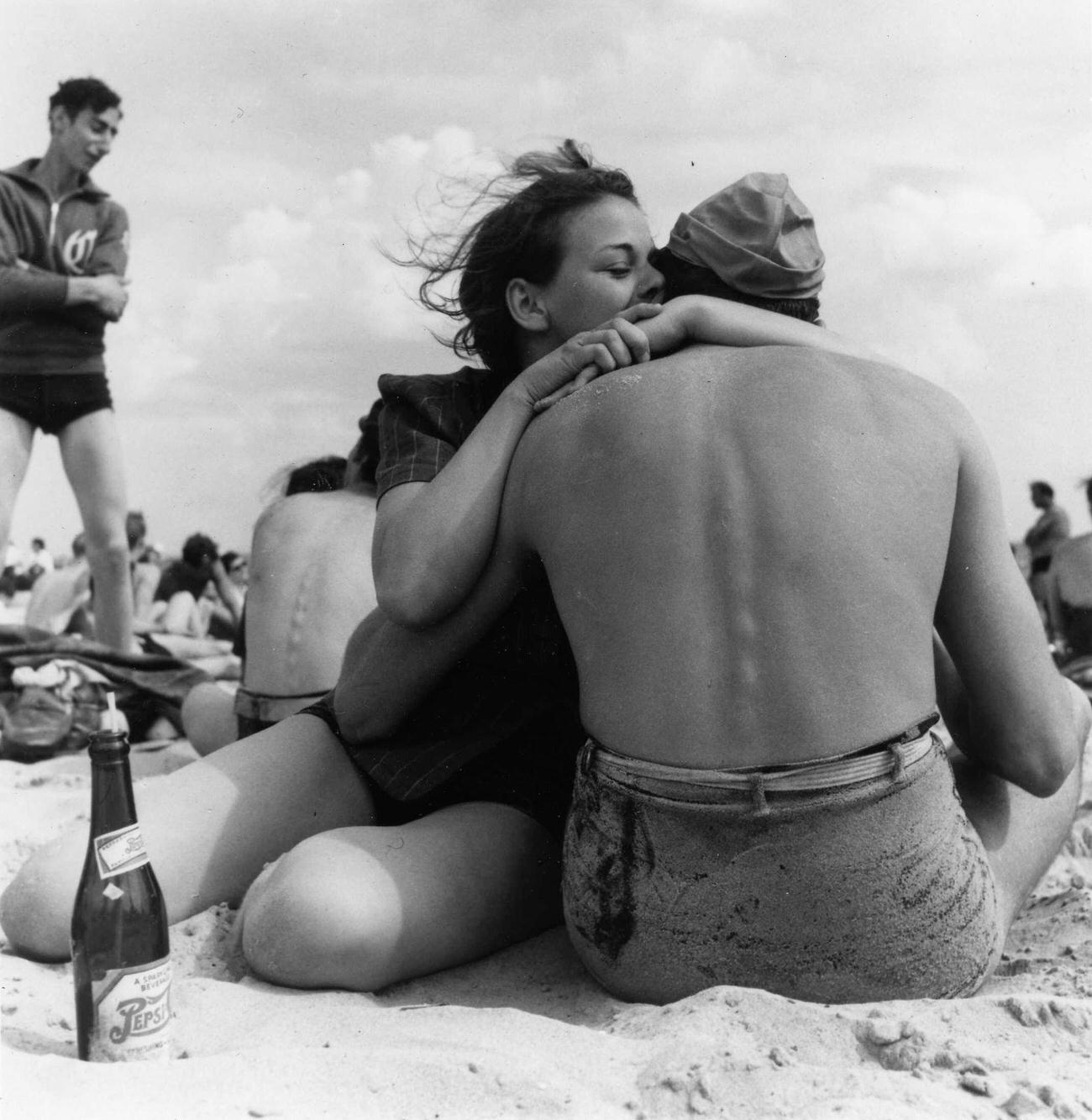 Couple Embraces On Crowded Coney Island Beach, 1938