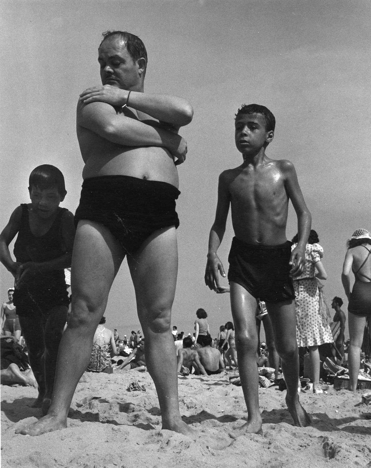Man Examines Shoulder On Coney Island Beach, 1938