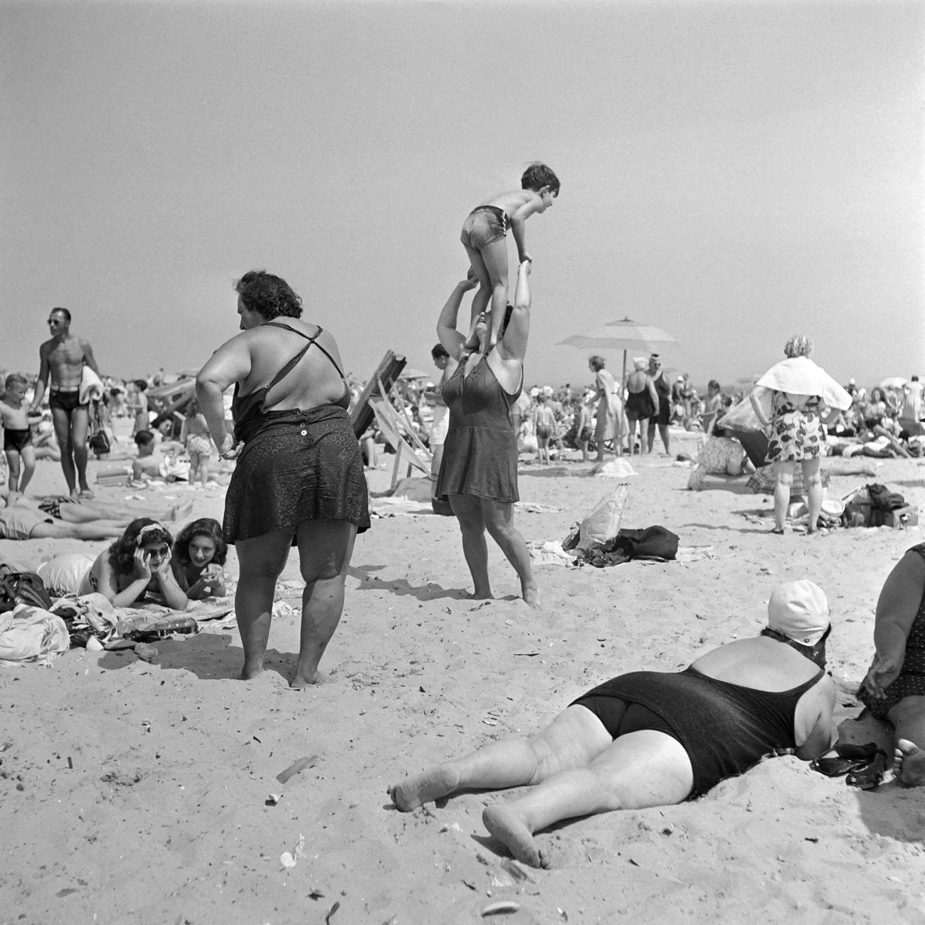 Playing And Sunbathing On Coney Island Beach, 1946