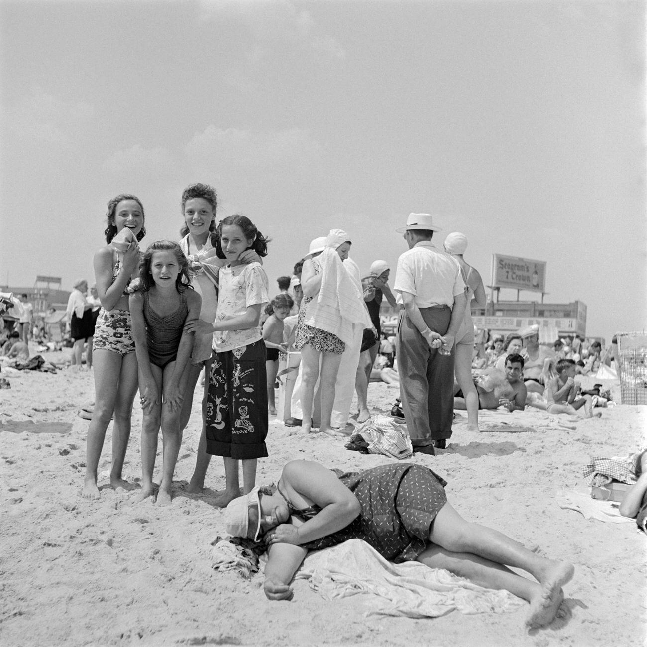 Children Pose As Woman Sleeps On Coney Island Beach, 1946