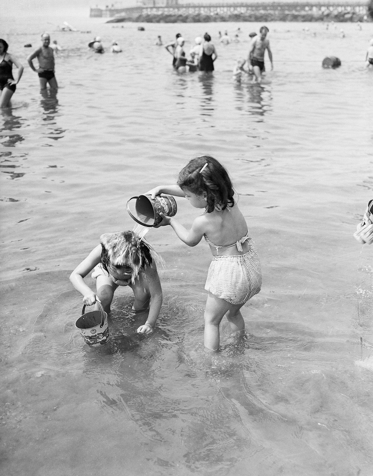 Girls Playing In Water At Coney Island, 1946