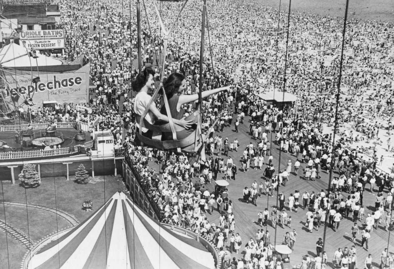 Holidaymakers On Fairground Ride, 1946