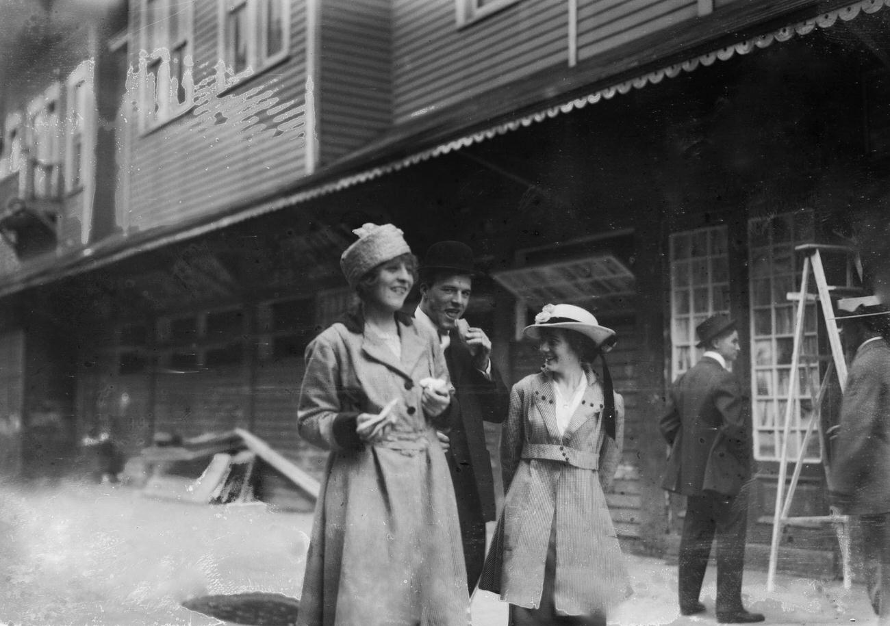 Visitors Eating Hot Dogs, 1915