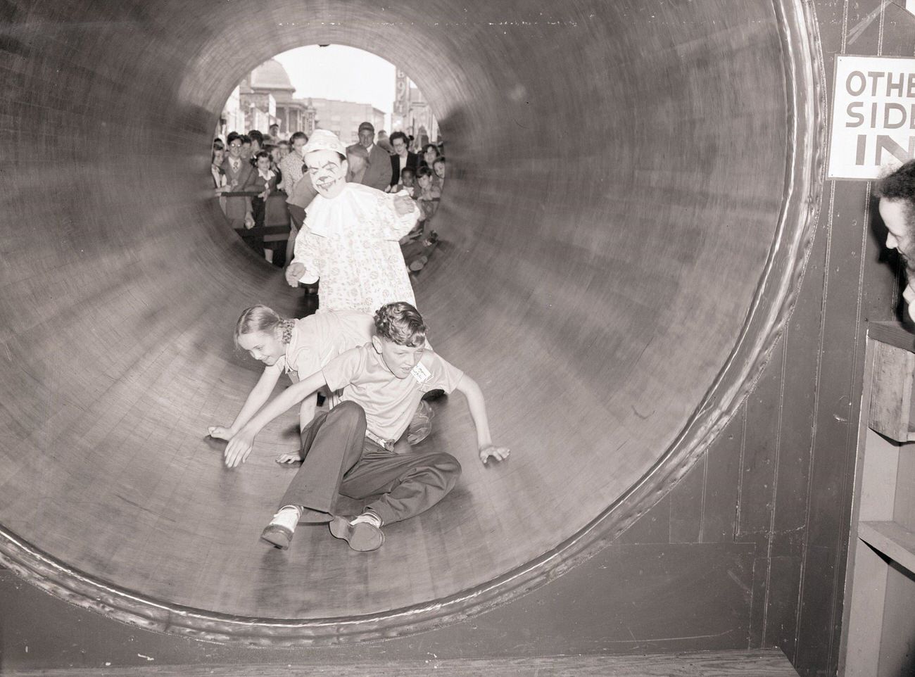 Clown And Kids Enjoy Rolling Barrel At Steeplechase Park, 1947