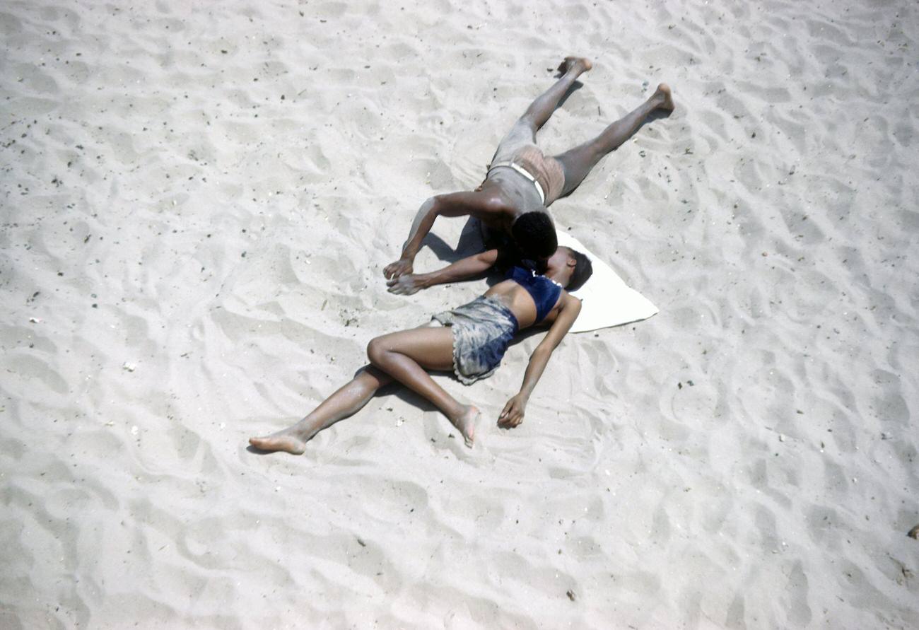 African American Couple Relaxes On Coney Island Beach, Circa 1948