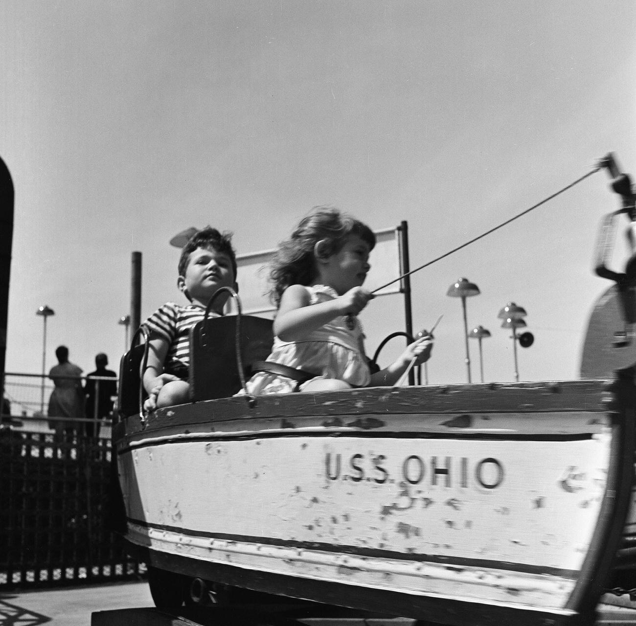 Siblings Enjoy Wooden Ride At Coney Island, 1948