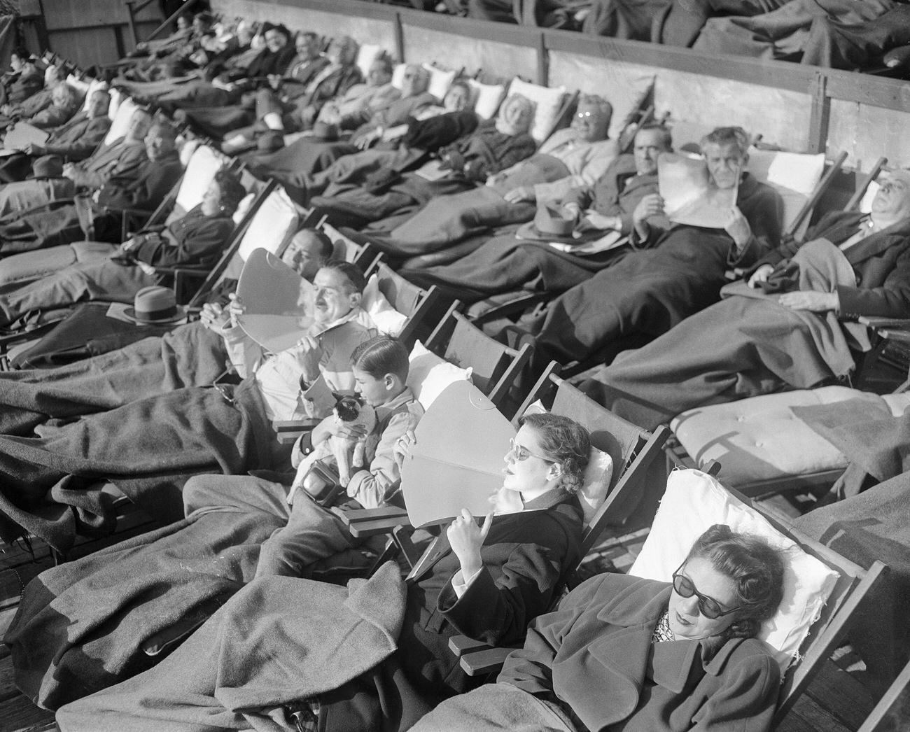 Sunbathing On A Sunny Autumn Day At Coney Island