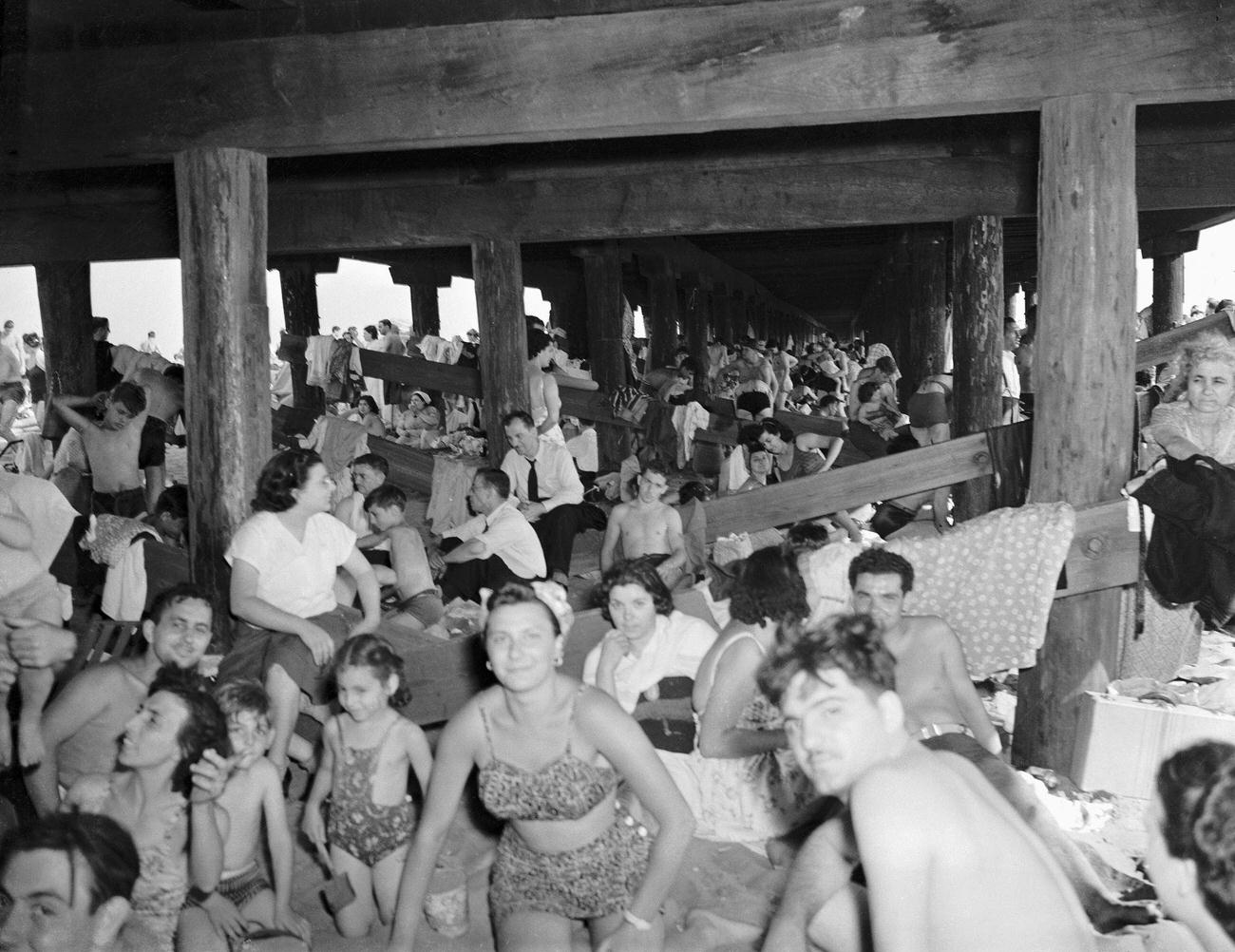 People Seeking Shade Under Boardwalk, July 1940