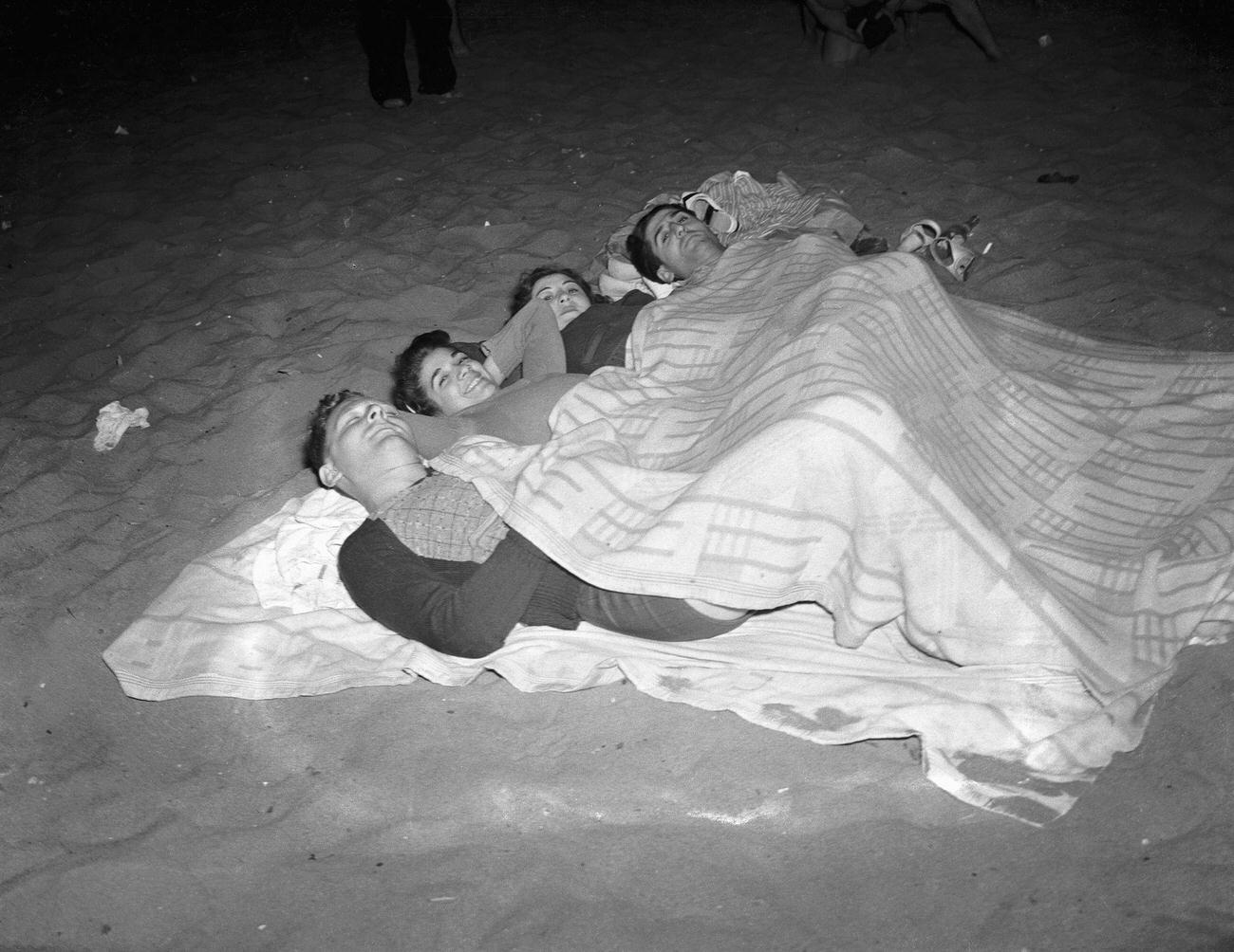 Four People Asleep On The Beach, July 1940