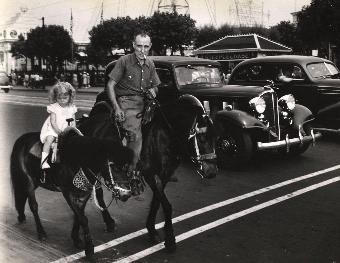 Man And Young Girl Enjoy Horse Ride At Steeplechase Park, 1941