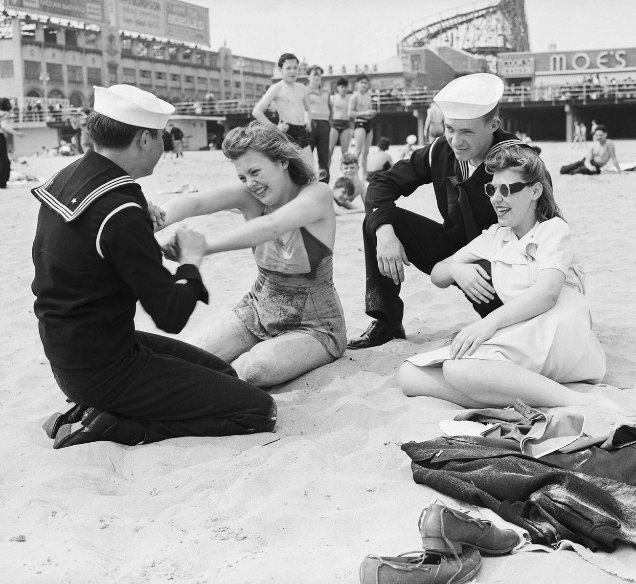 Coast Guard Sailors And Girlfriends Enjoy The Beach, 1943