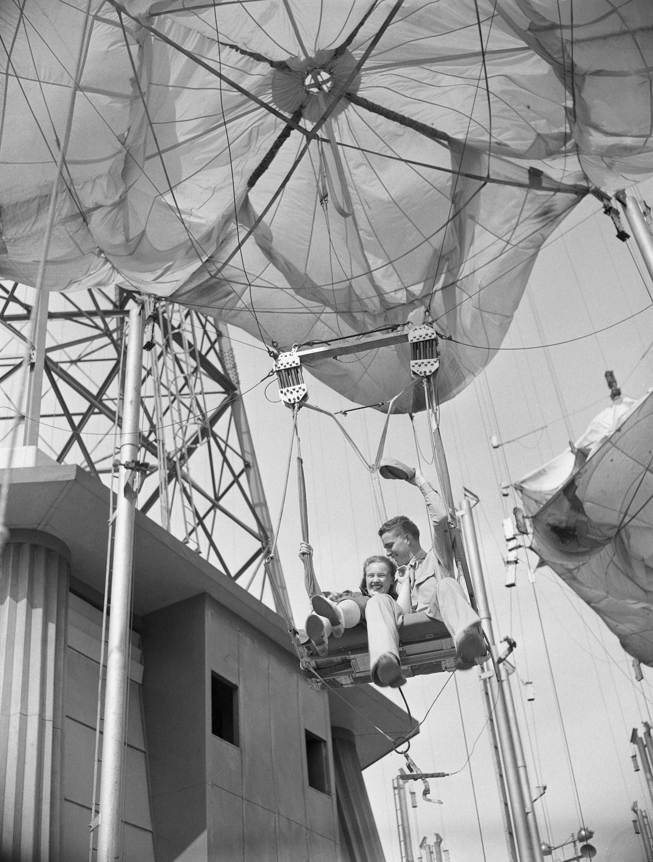 Couple Experiencing Parachute Tower At Steeplechase Park