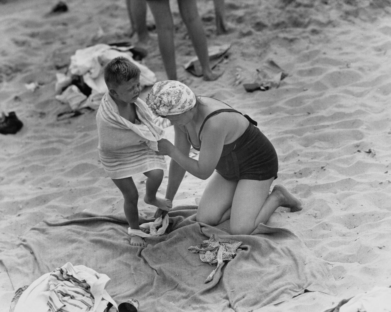 Mom And Son Argue Over More Beach Time At Coney Island, August 13, 1944