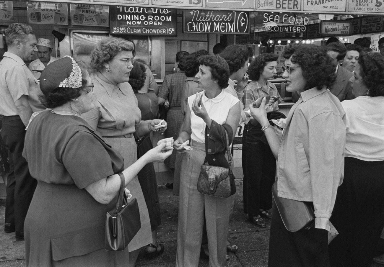 Women Eating At Nathan'S Famous Frankfurters In Coney Island, 1952.