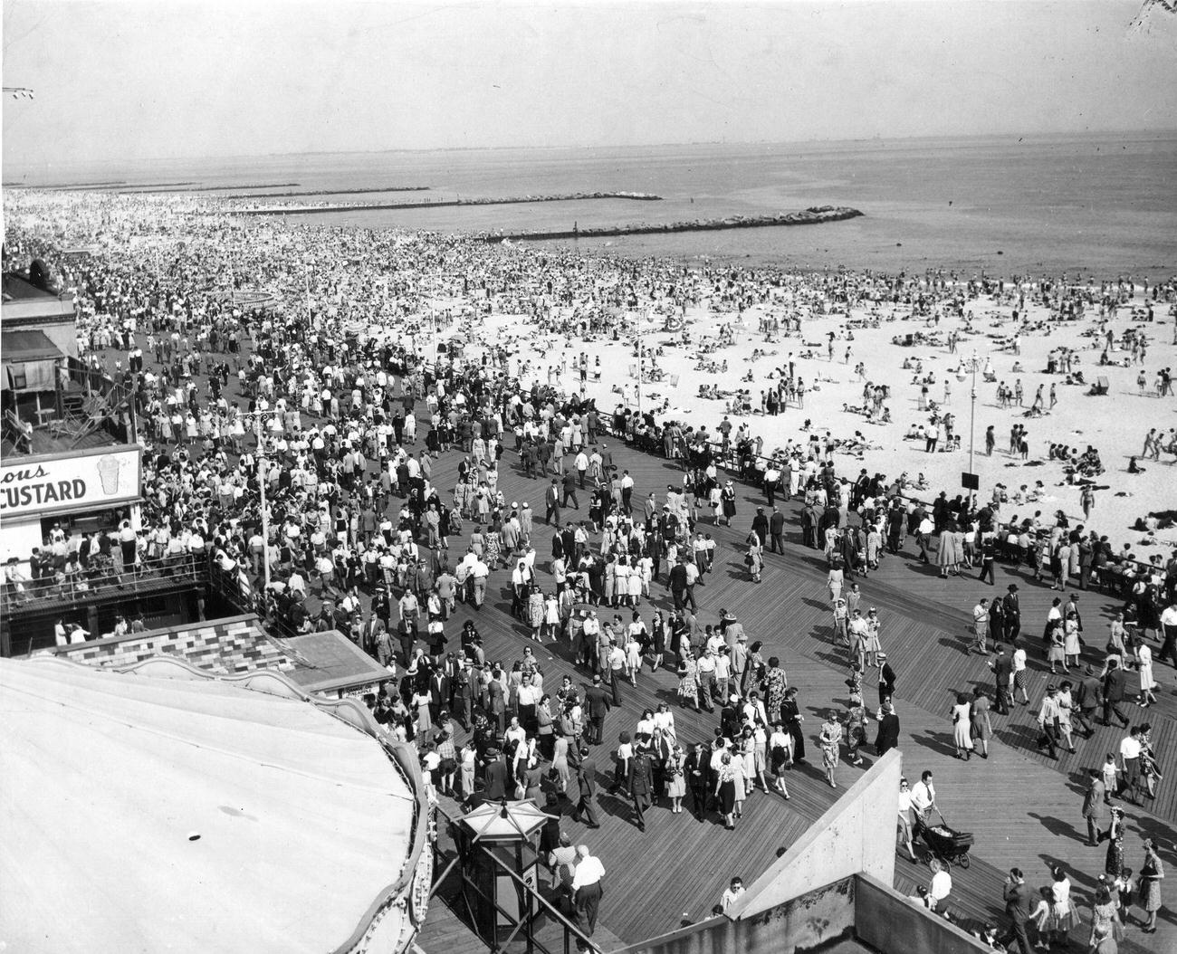 Elevated View Of Crowded Coney Island Boardwalk And Beach, 1950.