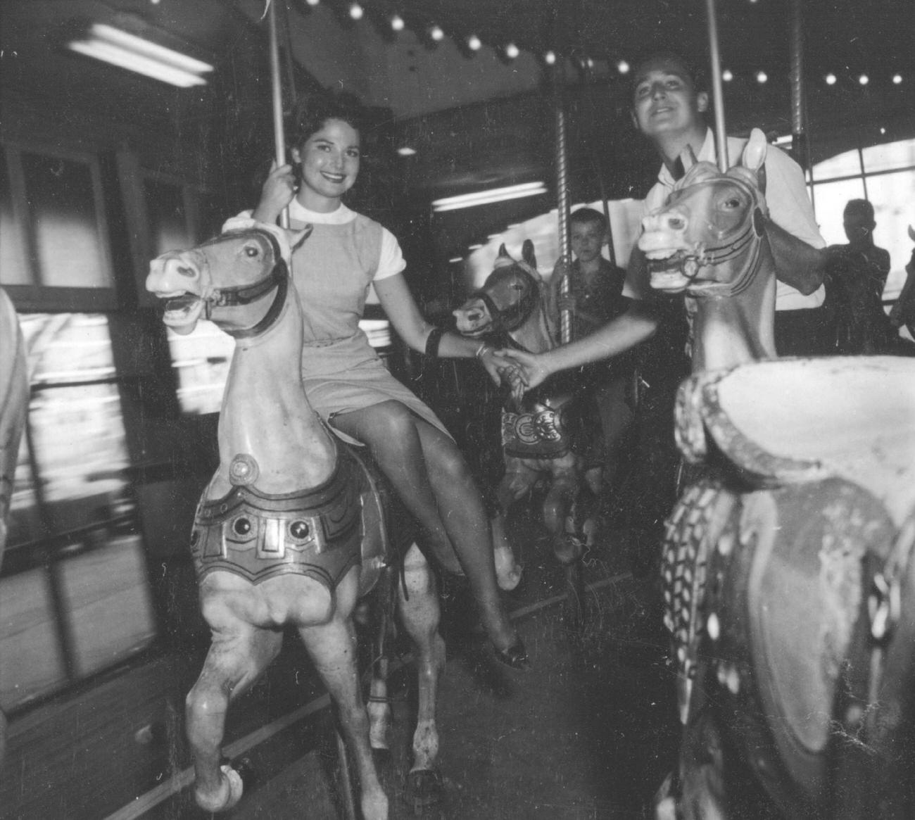 Neil Sedaka And Girlfriend Leba Enjoy A Carousel Ride, 1959
