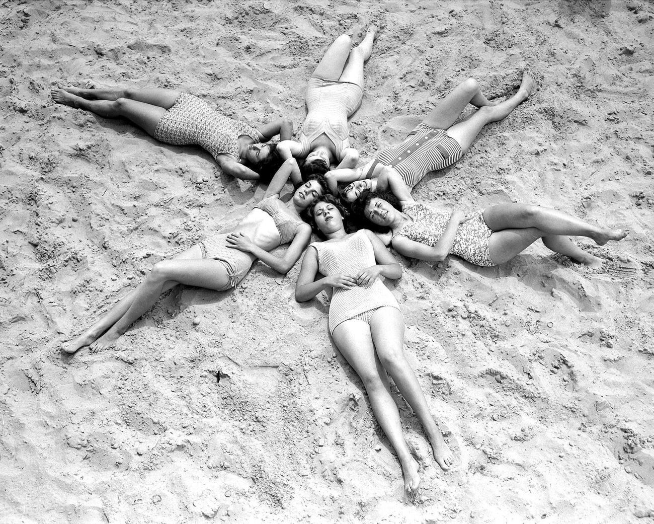 Group Of Women Soaking Up Sunshine At Coney Island
