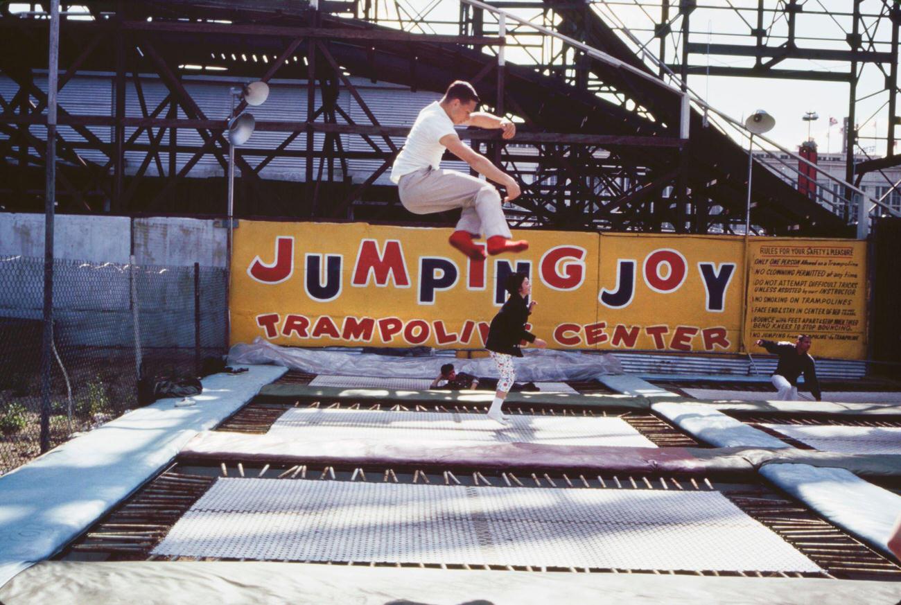 Four People On Trampolines At Coney Island Amusement Park, 1961