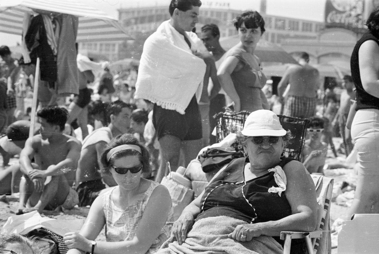 Holidaymakers Relaxing On Coney Island Beach, 1966
