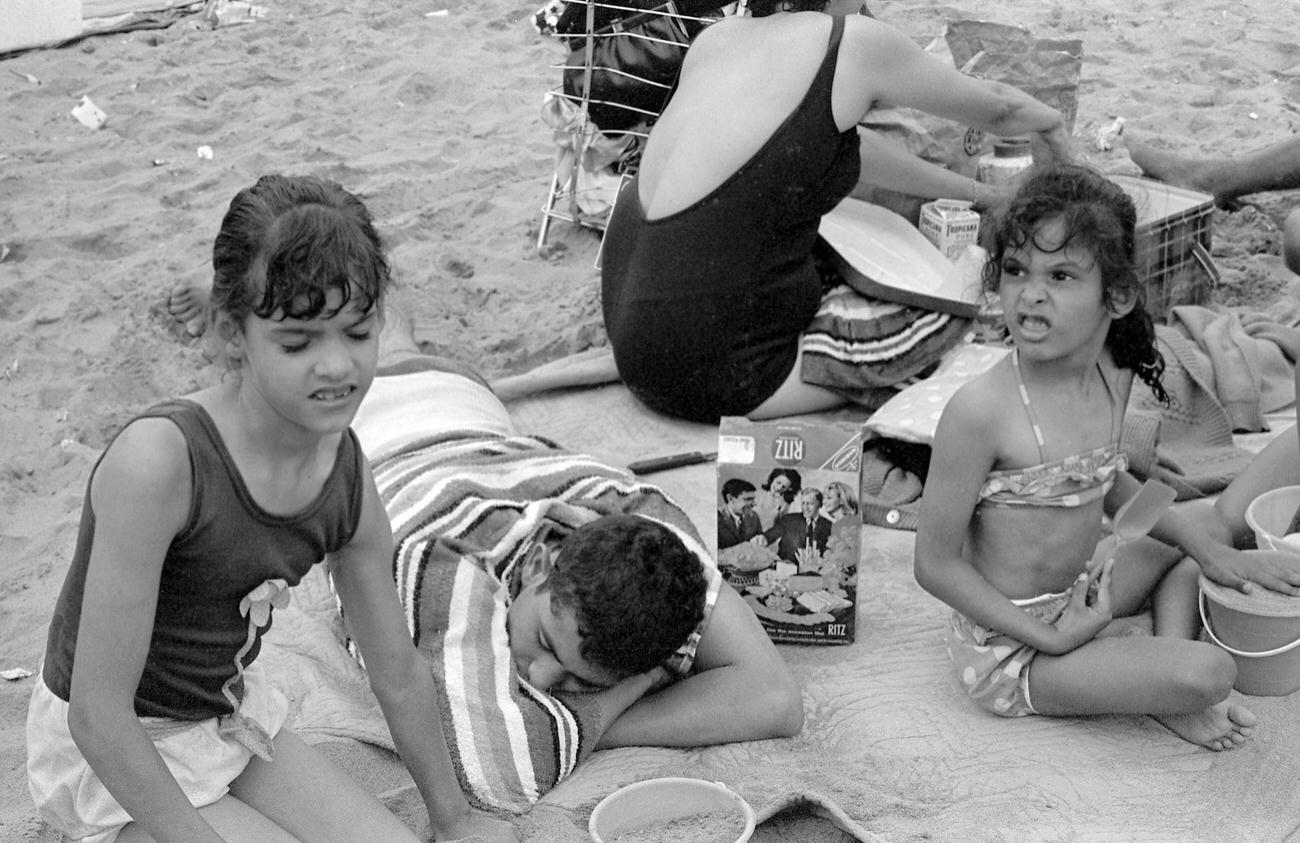 Girls And Sleeping Man On Coney Island Beach, 1968
