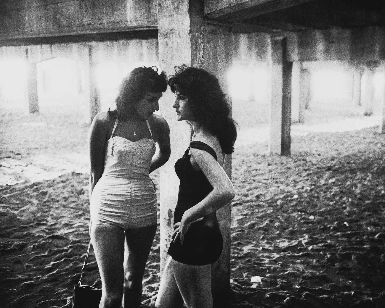 Teenage Girls Under The Coney Island Boardwalk