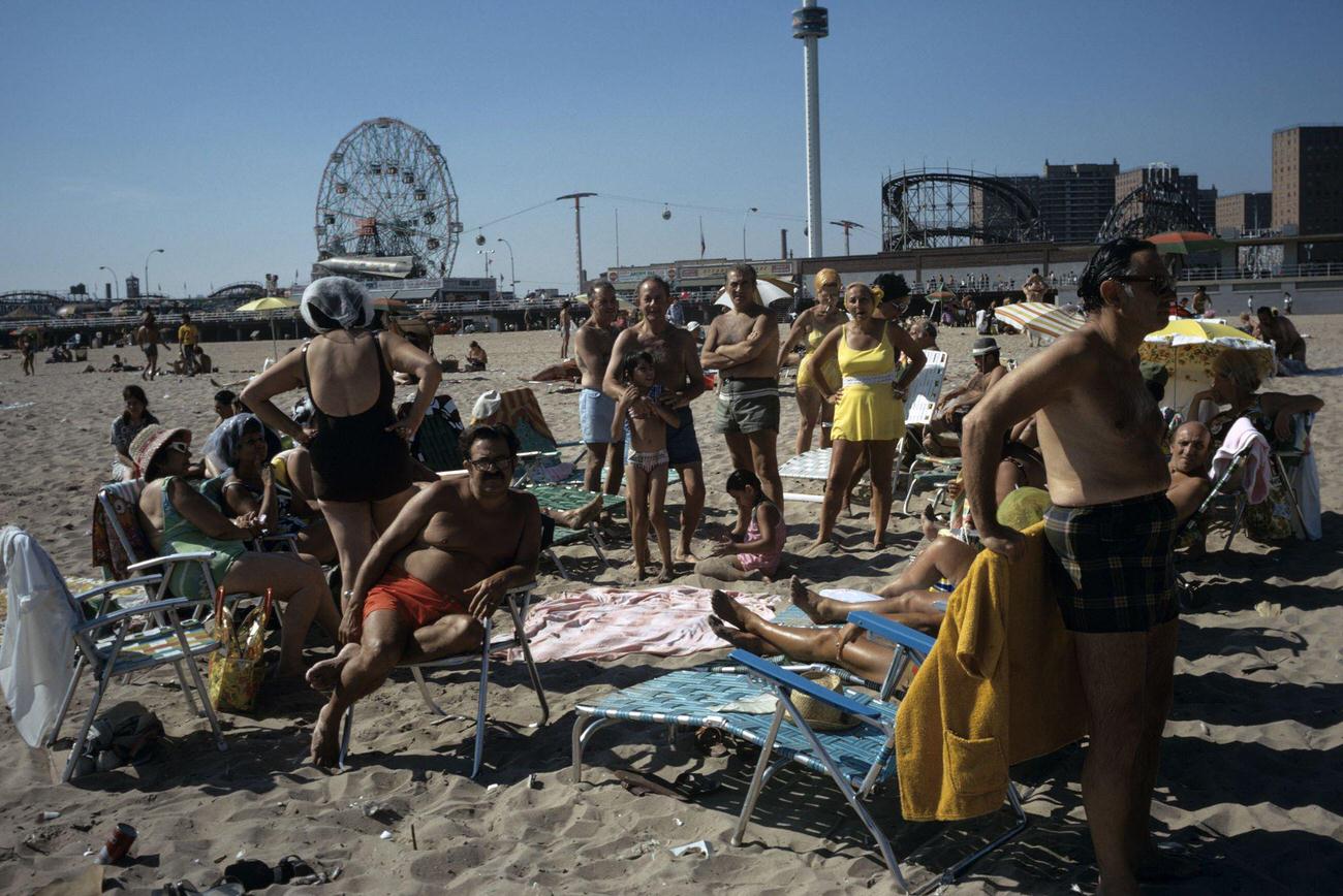 Group On Coney Island Beach In Front Of Wonder Wheel And Cyclone, 1971