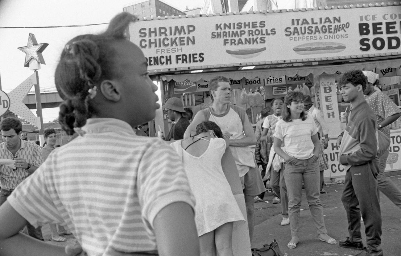 People In Front Of Concession Stand At Astroland Park, Coney Island, 1985