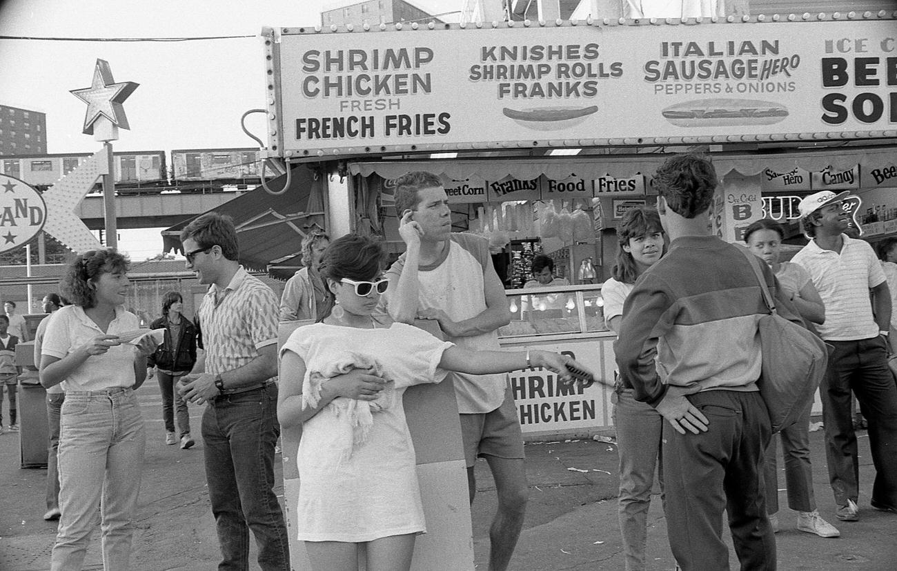 People In Front Of Concession Stand At Astroland Park, Coney Island, 1985