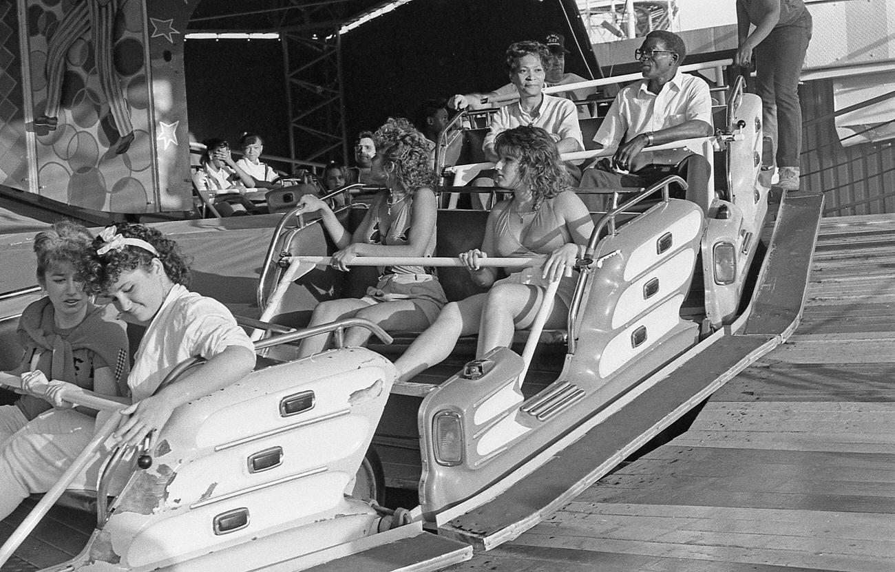 People Seated In Roller Coaster Cars At Astroland, Coney Island, 1985