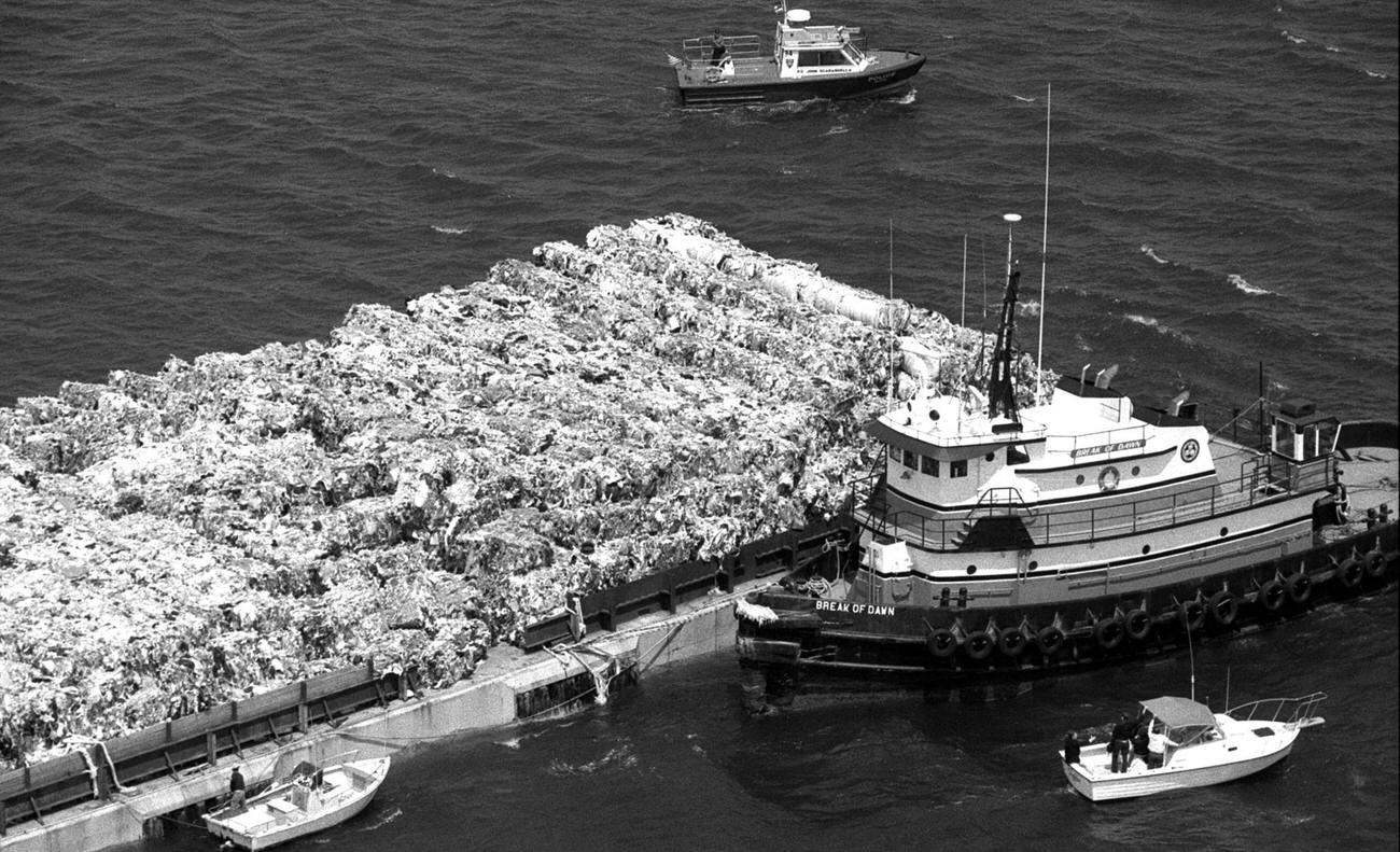 Garbage Barge Floating By Coney Island, 1989