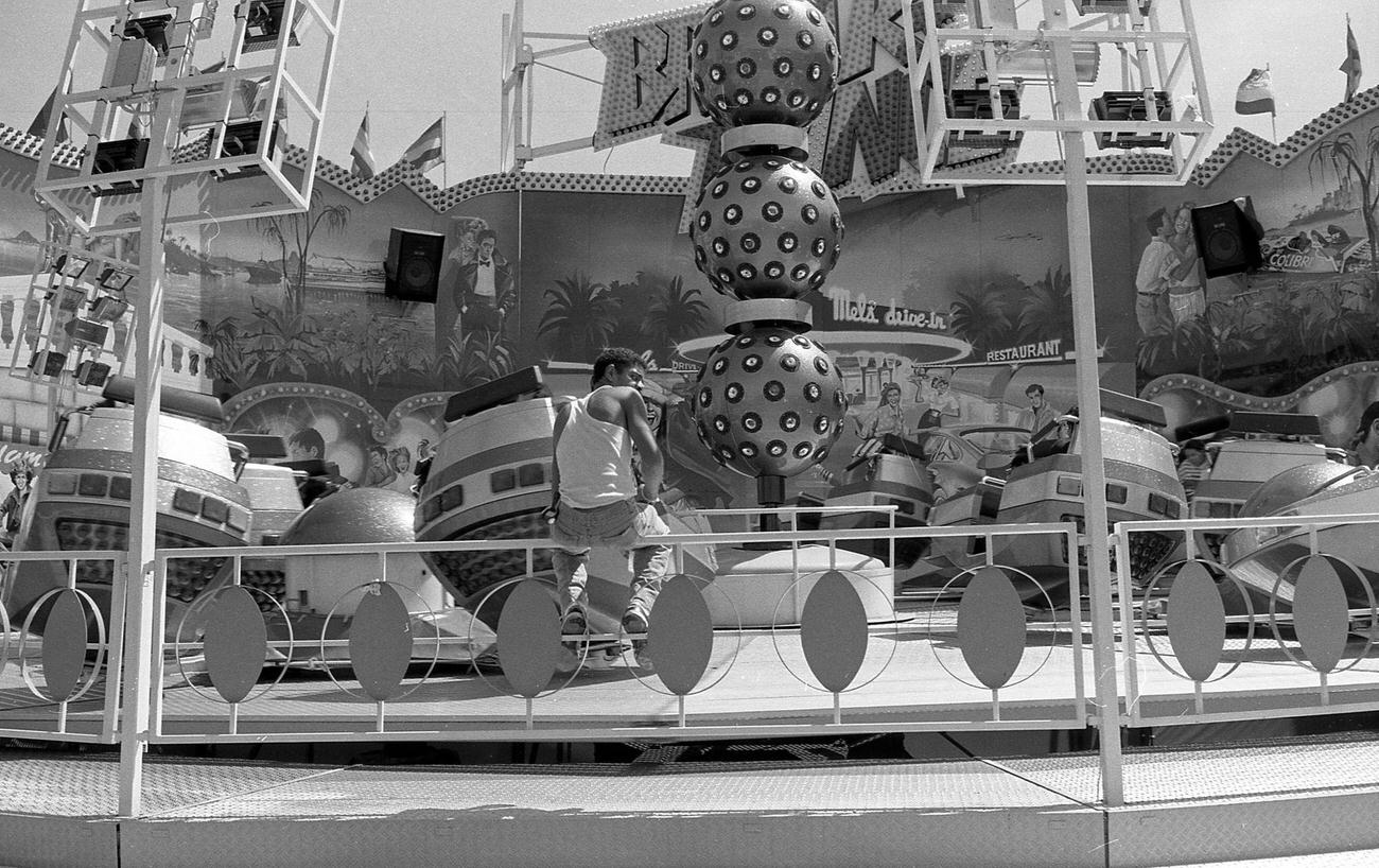 Ride Operator Overseeing An Attraction At Astroland Park, 1989